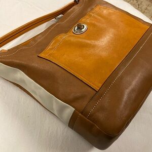 Color block coach with matching wallet.